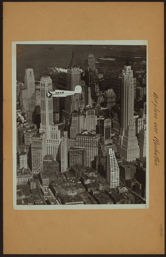 Art Print - Airplane over Manhattan ; [Ludington airliner Orion inaugurating shuttle services between Newark and Washington D.C.]